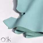 Folded Smart Tropical Finished Leather showcasing its color and texture
