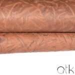 High-quality dark green snakeskin leather close-up
