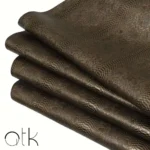High-quality dark metallic olive embossed snake scales leather material