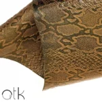 Light brown cobra print embossed leather piece for journals and bags
