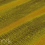 Luxury chartreuse crocodile print leather with intricate detailing