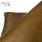 Luxury muddy croc print leather with an intricate pattern